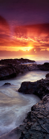 Stunning vertical panoramic of sunrise over Currumbin Rocks Gold Coast