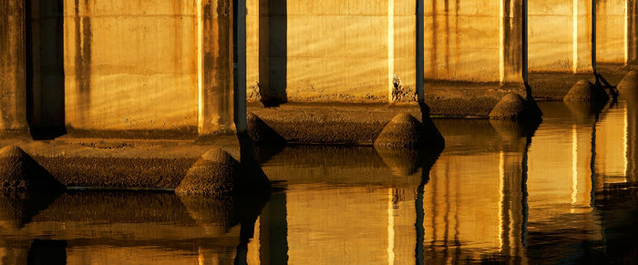 Historic old bridge in golden sunrise light