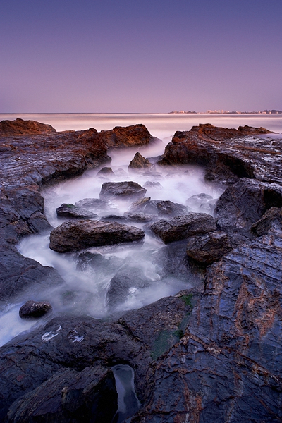 misty water rocks seascape twilight